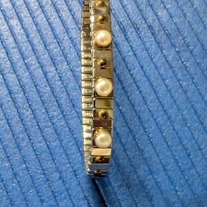 Elegant Silver and Gold Bracelet with Pearl Accents